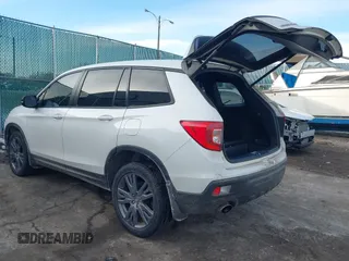 2019 Honda Passport EX-L with VIN 5FNYF8H5XKB008904, listed as a IAAI auction lot 41440706 with 57,317 mi miles and . Bid and sale history available at DreamBid. Image 3.