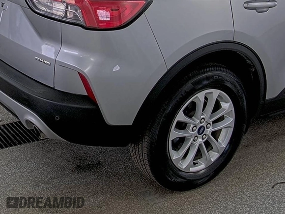2022 Ford Escape SE with VIN 1FMCU9G64NUB33193, listed as a IAAI auction lot 42733930 with 73,871 mi miles and . Bid and sale history available at DreamBid. Image 4.