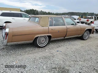 1988 Cadillac Brougham z VIN 1G6DW51Y5J9727006, wystawiony jako Copart lot #70573614 z przebiegiem 34 628 mil mil oraz Szkody całkowita. Historia ofert i sprzedaży dostępna na DreamBid. Obrazek 3.
