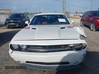 2014 Dodge Challenger R/T with VIN 2C3CDYBT6EH185590, listed as a IAAI auction lot 42536813 with 198,854 mi miles and . Bid and sale history available at DreamBid. Image 12.