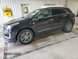 2021 Cadillac XT5 AWD Premium Luxury z VIN 1GYKNDRS6MZ137347, wystawiony jako Copart lot #57110945 z przebiegiem 36 014 mil mil oraz Szkoda całkowita • Salvage title. Historia ofert i sprzedaży dostępna na DreamBid. Obrazek 1.