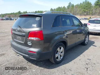 2012 Kia Sorento EX with VIN 5XYKUDA29CG285901, listed as a IAAI auction lot 42072736 with 152,991 mi miles. Bid and sale history available at carsss.com. Image 4.