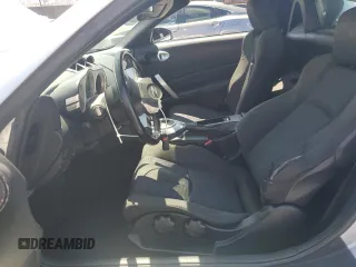 2007 Nissan 350Z Enthusiast z VIN JN1BZ36AX7M651304, wystawiony jako Copart lot #57164945 z przebiegiem 83 332 mil mil oraz Szkoda całkowita • Salvage title. Historia ofert i sprzedaży dostępna na DreamBid. Obrazek 7.