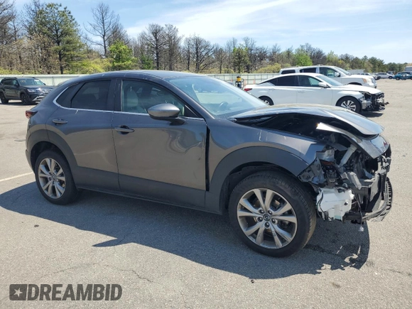 2021 Mazda CX-30 Preferred with VIN 3MVDMBCL5MM262458, listed as a Copart auction lot 56368995 with 77,394 mi miles and Salvage title. Bid and sale history available at DreamBid. Image 4.