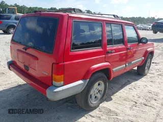 2001 Jeep Cherokee Sport z VIN 1J4FT48S01L508039, wystawiony jako IAAI lot #42743009 z przebiegiem 200 074 mil mil oraz . Historia ofert i sprzedaży dostępna na DreamBid. Obrazek 4.