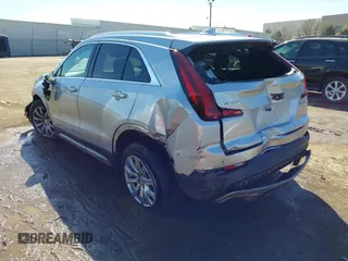 2019 Cadillac XT4 FWD Premium Luxury with VIN 1GYFZCR47KF110481, listed as a IAAI auction lot 41771338 with 103,124 mi miles and . Bid and sale history available at carsss.com. Image 3.