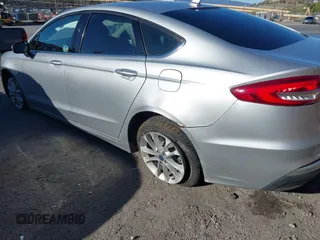 2019 Ford Fusion SE with VIN 3FA6P0LUXKR208139, listed as a IAAI auction lot 41820958 with 66,609 mi miles and . Bid and sale history available at DreamBid. Image 6.