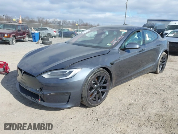 2021 Tesla Model S Plaid with VIN 5YJSA1E60MF455768, listed as a IAAI auction lot 41603504 with 27,398 mi miles. Bid and sale history available at carsss.com. Image 2.
