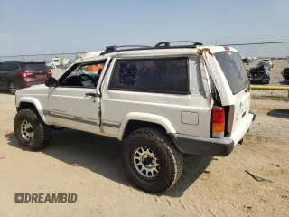 2001 Jeep Grand Cherokee with VIN 1J4FT47S21L596528, listed as a Copart auction lot 68641764 with Not provided miles and Salvage title. Bid and sale history available at DreamBid. Image 2.