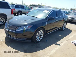2014 Lincoln MKS with VIN 1LNHL9DK0EG600330, listed as a IAAI auction lot 41953968 with 228,668 mi miles. Bid and sale history available at carsss.com. Image 2.
