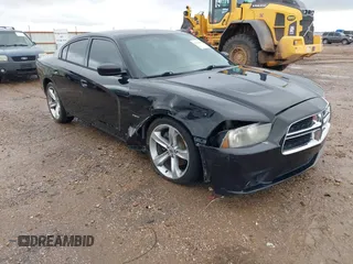 2014 Dodge Charger RT z VIN 2C3CDXCT1EH330253, wystawiony jako IAAI lot #42181994 z przebiegiem 99 109 mil mil oraz . Historia ofert i sprzedaży dostępna na DreamBid. Obrazek 1.
