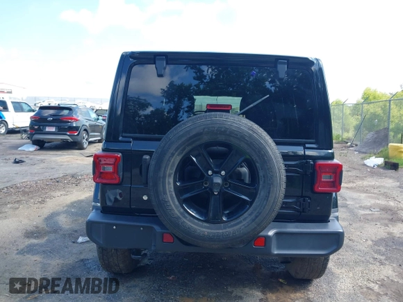 2020 Jeep Wrangler Unlimited Sahara z VIN 1C4HJXEN6LW106869, wystawiony jako IAAI lot #42390113 z przebiegiem 56 907 mil mil oraz . Historia ofert i sprzedaży dostępna na DreamBid. Obrazek 17.