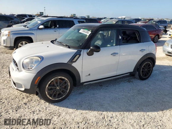 2016 MINI Countryman S with VIN WMWZC5C51GWU01290, listed as a Copart auction lot 77684384 with 106,811 mi miles and Salvage Title. Bid and sale history available at DreamBid. Image 1.