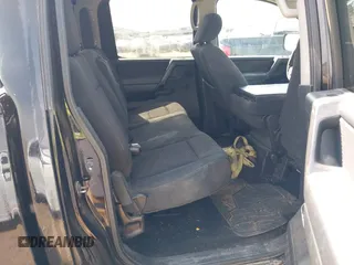 2012 Nissan Titan SV with VIN 1N6AA0EK2CN306066, listed as a IAAI auction lot 42106379 with 135,556 mi miles and . Bid and sale history available at DreamBid. Image 8.