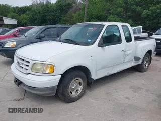 2003 Ford F-150 XL with VIN 1FTRX07263KD53880, listed as a IAAI auction lot 42422353 with 192,630 mi miles and . Bid and sale history available at DreamBid. Image 2.