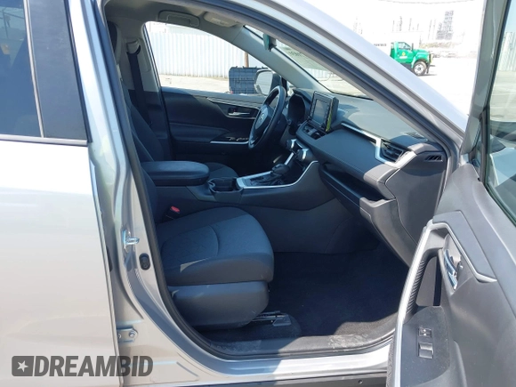 2020 Toyota RAV4 XLE with VIN 2T3W1RFV4LW097198, listed as a IAAI auction lot 42771030 with 33,354 mi miles and . Bid and sale history available at DreamBid. Image 5.