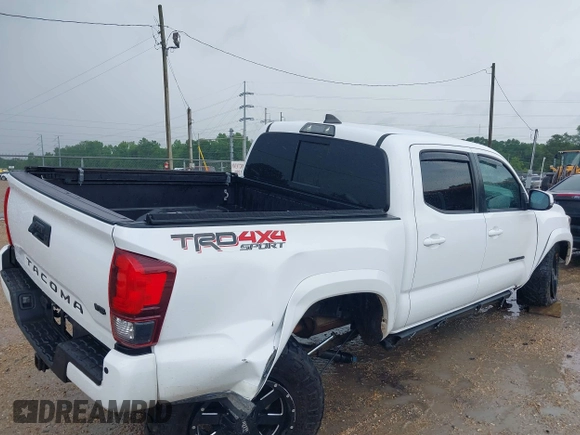 2019 Toyota Tacoma SR z VIN 3TMCZ5AN0KM232852, wystawiony jako IAAI lot #42178269 z przebiegiem 71 545 mil mil oraz . Historia ofert i sprzedaży dostępna na DreamBid. Obrazek 6.