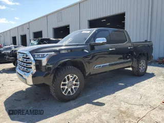 2023 Toyota Tundra 1794 Edition with VIN 5TFMA5AB6PX023148, listed as a Copart auction lot 52284665 with 47,866 mi miles and Salvage title. Bid and sale history available at DreamBid. Image 1.