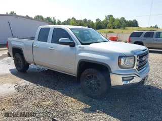 2016 GMC Sierra 1500 SLE with VIN 1GTV2MEC7GZ283271, listed as a IAAI auction lot 40133147 with 205,464 mi miles. Bid and sale history available at carsss.com. Image 1.