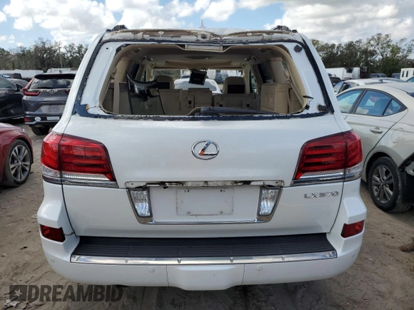 2015 Lexus LX 570 with VIN JTJHY7AX7F4169804, listed as a Copart auction lot 79885024 with 55,392 mi miles and Salvage Title. Bid and sale history available at DreamBid. Image 6.