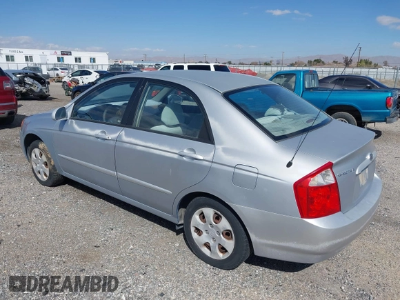 2004 Kia Spectra LX with VIN KNAFE122645052206, listed as a IAAI auction lot 41767864 with 63,866 mi miles. Bid and sale history available at carsss.com. Image 3.