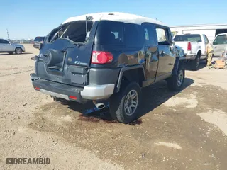 2008 Toyota FJ Cruiser with VIN JTEBU11F38K016727, listed as a IAAI auction lot 41514574 with 173,282 mi miles. Bid and sale history available at carsss.com. Image 4.