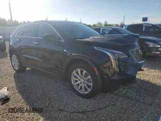2022 Cadillac XT4 FWD Luxury with VIN 1GYAZAR45NF136810, listed as a Copart auction lot 74359664 with 10,552 mi miles and Salvage title. Bid and sale history available at DreamBid. Image 4.