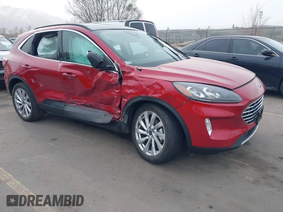 2021 Ford Escape Titanium Hybrid with VIN 1FMCU9DZ1MUA01599, listed as a IAAI auction lot 41912441 with 20,660 mi miles and . Bid and sale history available at DreamBid. Image 1.