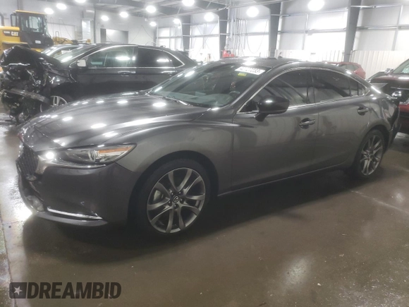 2021 Mazda 6 Signature with VIN JM1GL1XY5M1605378, listed as a Copart auction lot 42727233 with 39,448 mi miles and . Bid and sale history available at DreamBid. Image 1.