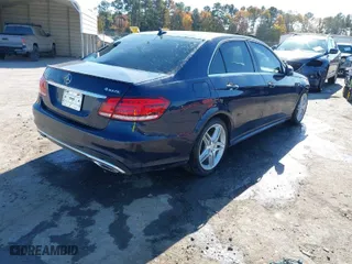 2014 Mercedes-Benz E-Class E 350 Luxury with VIN WDDHF8JB9EA842584, listed as a IAAI auction lot 40699399 with 160,687 mi miles. Bid and sale history available at carsss.com. Image 4.