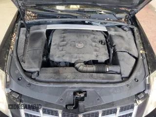 2013 Cadillac CTS Luxury z VIN 1G6DG5E57D0112818, wystawiony jako Copart lot #57937755 z przebiegiem 148 751 mil mil oraz Czysty tytuł • Clean title. Historia ofert i sprzedaży dostępna na DreamBid. Obrazek 11.