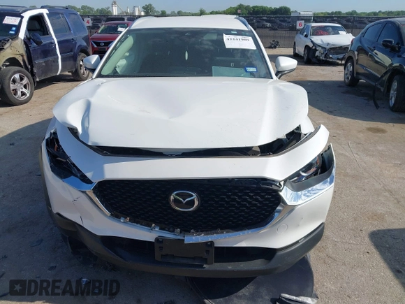 2023 Mazda CX-30 S Carbon Edition with VIN 3MVDMBCM2PM552282, listed as a IAAI auction lot 42241909 with 14,765 mi miles and . Bid and sale history available at DreamBid. Image 6.