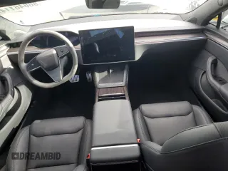 2024 Tesla Model S с VIN 5YJSA1E59RF541014, выставлен на аукционе Copart как лот 86646114 с пробегом 7 404 миль миль и Списание • Salvage title. История ставок и продаж доступна на DreamBid. Изображение 8.