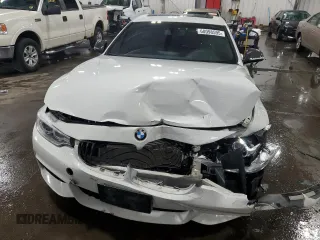 2014 BMW 4 Series 435i with VIN WBA3R1C52EK192076, listed as a Copart auction lot 60098595 with 89,504 mi miles and Salvage title. Bid and sale history available at DreamBid. Image 5.
