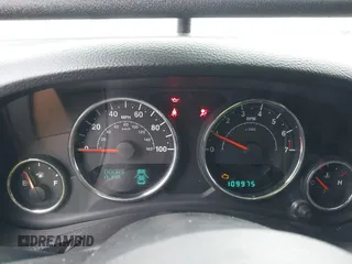 2014 Jeep Wrangler Unlimited Sahara with VIN 1C4BJWEG1EL127232, listed as a IAAI auction lot 41847368 with 109,975 mi miles. Bid and sale history available at carsss.com. Image 7.