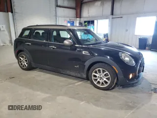 2017 MINI Clubman Cooper with VIN WMWLU1C55H2F26865, listed as a Copart auction lot 75981404 with 98,979 mi miles and Salvage Title. Bid and sale history available at carsss.com. Image 4.