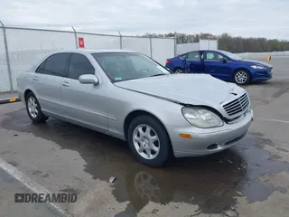 2000 Mercedes-Benz S-Class with VIN WDBNG70JXYA054073, listed as a IAAI auction lot 41987179 with 124,968 mi miles. Bid and sale history available at carsss.com. Image 1.