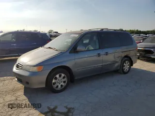 2002 Honda Odyssey EX z VIN 2HKRL18612H567644, wystawiony jako Copart lot #64448235 z przebiegiem 319 338 mil mil oraz Czysty tytuł • Clean title. Historia ofert i sprzedaży dostępna na DreamBid. Obrazek 1.