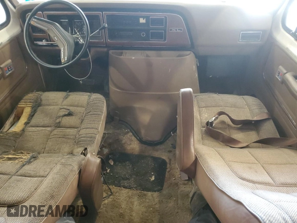 1987 Ford Econoline Cargo with VIN 1FTEE24N6HHB45016, listed as a Copart auction lot 50947745 with 62,721 mi miles and Salvage Title. Bid and sale history available at DreamBid. Image 8.
