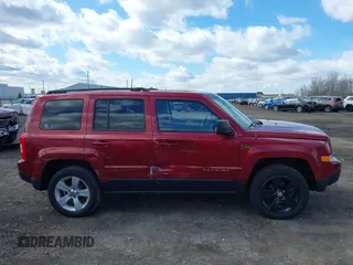 2014 Jeep Patriot Latitude with VIN 1C4NJRFB4ED897890, listed as a IAAI auction lot 41978399 with 76,688 mi miles. Bid and sale history available at carsss.com. Image 13.