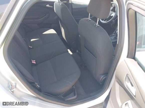 2016 Ford Focus SE with VIN 1FADP3K29GL269691, listed as a IAAI auction lot 42061051 with 100,692 mi miles. Bid and sale history available at carsss.com. Image 8.