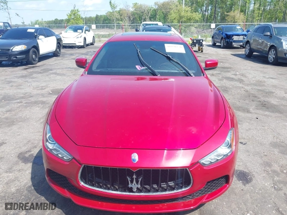 2015 Maserati Ghibli with VIN ZAM57XSA5F1129883, listed as a IAAI auction lot 41920750 with 63,739 mi miles. Bid and sale history available at carsss.com. Image 12.