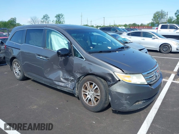 2011 Honda Odyssey EX-L with VIN 5FNRL5H62BB058765, listed as a IAAI auction lot 42017802 with 178,512 mi miles and . Bid and sale history available at carsss.com. Image 1.