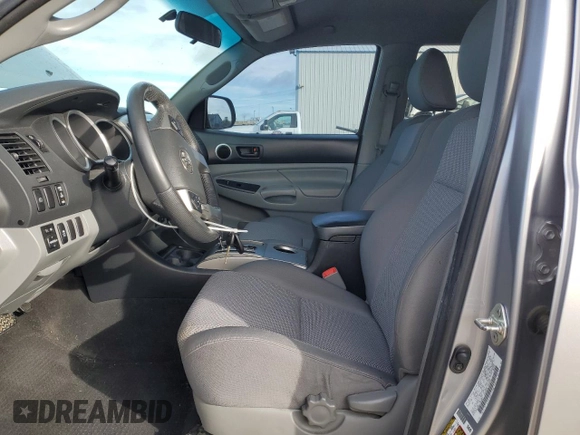 2014 Toyota Tacoma PreRunner with VIN 3TMJU4GN3EM163067, listed as a Copart auction lot 41582155 with 101,971 mi miles and Salvage Title. Bid and sale history available at DreamBid. Image 7.