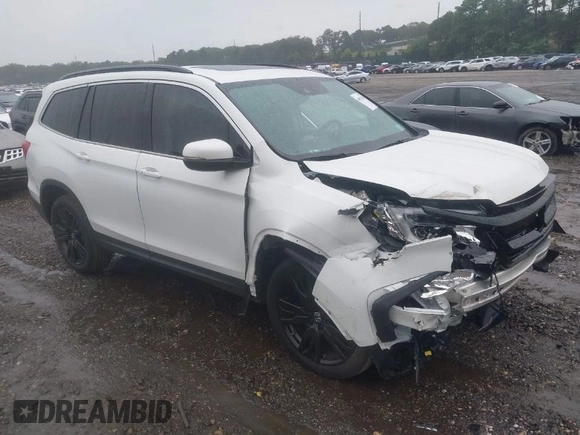 2021 Honda Pilot Special Edition with VIN 5FNYF6H28MB048296, listed as a IAAI auction lot 40012452 with 50,011 mi miles. Bid and sale history available at carsss.com. Image 1.