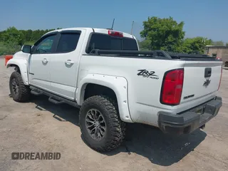2019 Chevrolet Colorado 4WD ZR2 with VIN 1GCGTEEN9K1335858, listed as a IAAI auction lot 42447016 with 47,303 mi miles and . Bid and sale history available at DreamBid. Image 3.