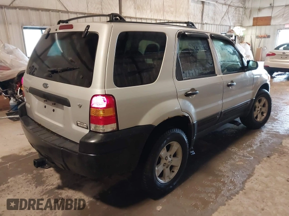 2006 Ford Escape XLT with VIN 1FMYU03196KA11342, listed as a IAAI auction lot 42237654 with 146,929 mi miles and . Bid and sale history available at DreamBid. Image 4.