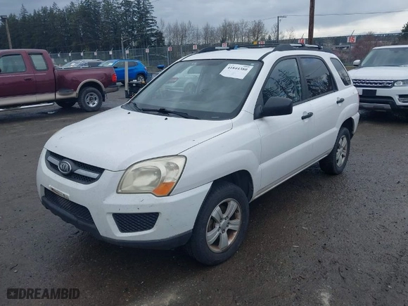 2009 Kia Sportage LX with VIN KNDJF724X97575853, listed as a IAAI auction lot 41844380 with 96,940 mi miles. Bid and sale history available at carsss.com. Image 2.