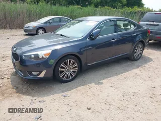 2014 Kia Cadenza Premium z VIN KNALN4D70E5129957, wystawiony jako IAAI lot #42410349 z przebiegiem 217 570 mil mil oraz . Historia ofert i sprzedaży dostępna na DreamBid. Obrazek 2.