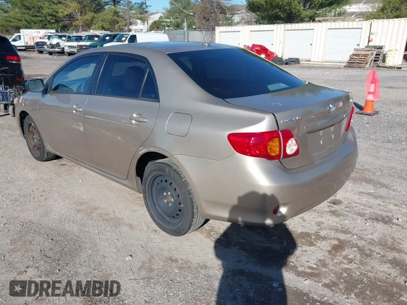 2009 Toyota Corolla with VIN 1NXBU40E69Z003339, listed as a IAAI auction lot 41830174 with 251,354 mi miles. Bid and sale history available at carsss.com. Image 3.